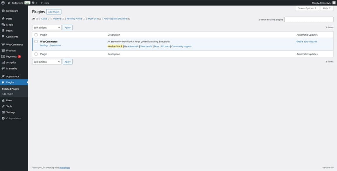 WordPress Plugins page displaying WooCommerce with version 9.0 shown directly below the plugin name